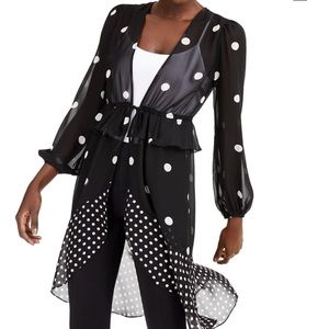 Sheer.New w tags. From macys. Wear as with a camisole or as a bath suit cover up